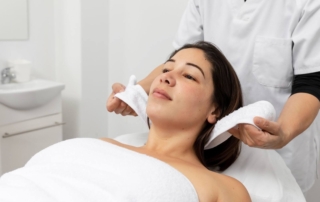 Woman receiving a vampire facial treatment with PRP therapy for glowing and rejuvenated skin
